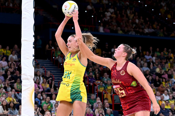 Cara Koenen of Australia intercepts a pass meant for England shooter Eleanor Cardwell.