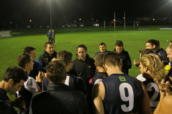 Simon Lethlean with a VAFA team in 2013.