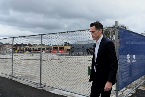 NSW Premier Chris Minns walks past the Annandale site of the first build-to-rent essential worker housing. 