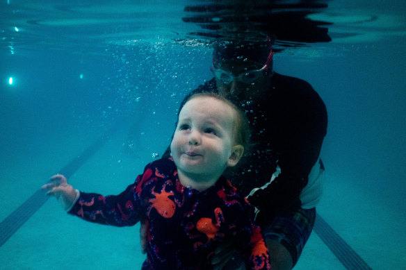  Swim instructor Rajesh Bhardwaj takes 17-month-old James Radman for water safety lessons at Speedo Swim Centre in Bondi Beach.