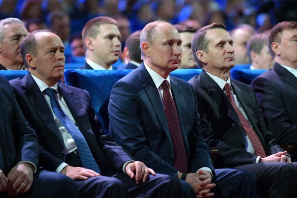 Vladimir Putin with Sergei Naryshkin on his right in December 2019.
