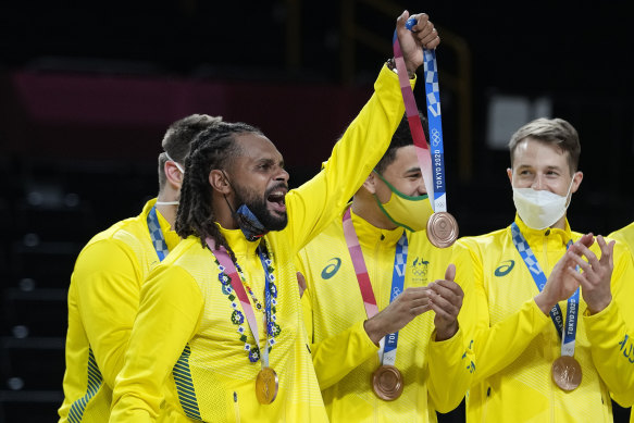 Patty Mills celebrates Boomers bronze in Tokyo.