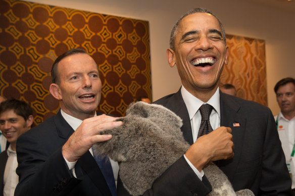 Tony Abbott, Barack Obama and a furry friend from Lone Pine at the Brisbane G20 in 2014.