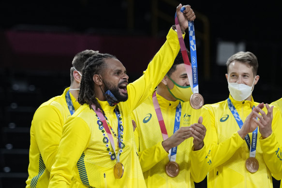 Patty Mills celebrates Boomers bronze in Tokyo.