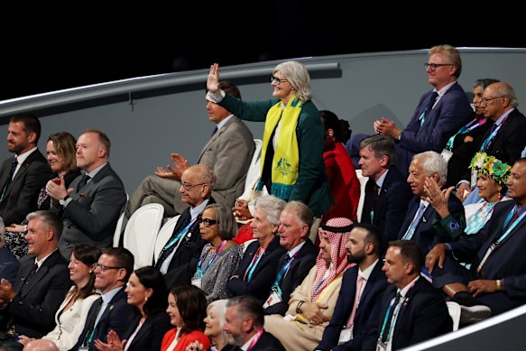 HE the Governor-General Sam Mostyn in the royal box waving to the Australian team at the opening of the Commonwealth Games in Glascow.