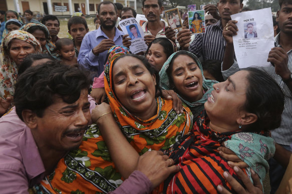 Relatives of a garment worker who perished in the 2013 Rana Plaza tragedy. Since then, the fashion industry has been under pressure to clean up its act.
