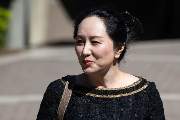 Meng Wanzhou leaves her home to attend the extradition hearing in Vancouver on Wednesday. 