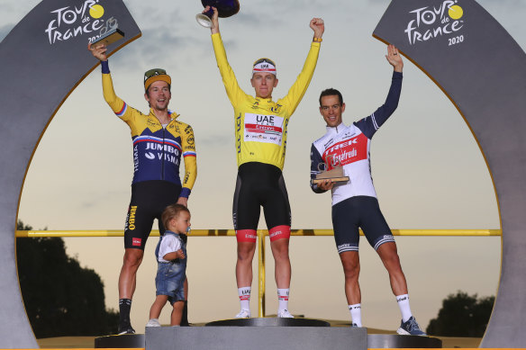 Tour de France winner Tadej Pogacar on the top step with Primoz Roglic (left) and Richie Porte (right).