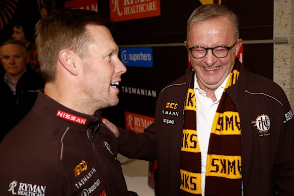 Prime Minister Anthony Albanese was a happy Hawk alongside Sam Mitchell.