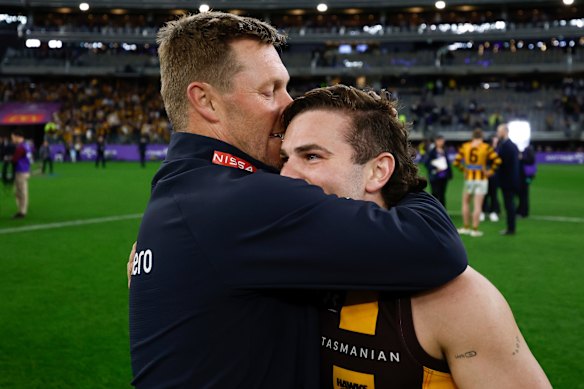 A kiss on the head from Hawthorn coach Sam Mitchell to Nick Watson after the qualifying final win over Fremantle.