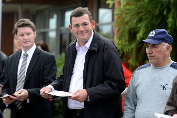 Ben Carroll (left) and Andrews handing out how-to-vote cards back in 2012. 