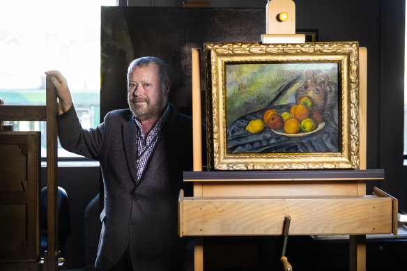 Curator Dr Ted Gott with Cezanne’s “Fruit and a Jug on a Table”.