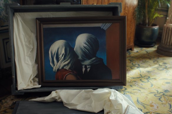 Magritte's famous painting The Lovers plays a very important role in the story.