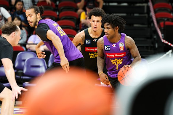 Kendric Davis (right) and Xavier Cooks (left) at Sydney Kings training at Qudos Bank Arena on Wednesday.