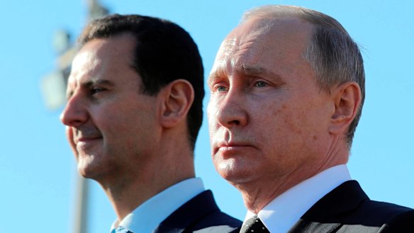 Russian President Vladimir Putin, right, and Syrian President Bashar Assad in December.