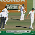 Travis Head talks to Marques Ackerman as the batter looks at Marnus Labuschagne.