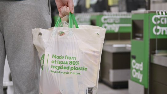 Woolworths and Big W will phase out reusable plastic bags by June next year.
