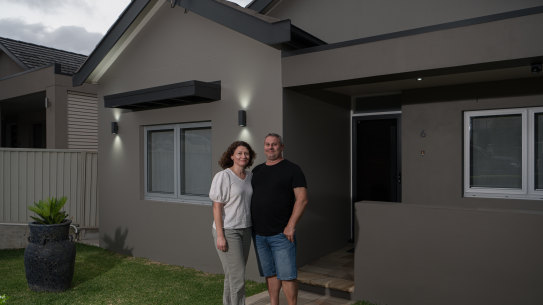 Monica and George Triantafyllou outside their Earlwood home that is currently on the market with a guide of $2.3 million.