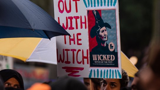 A placard at the Don't Kill Live Music rally depicts NSW Premier Gladys Berejiklian as a witch. 