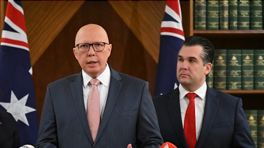 Sarah Henderson (left) alongside Peter Dutton and Michael Sukkar.