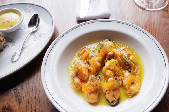 Mussels in an escabeche broth with saffron aioli (left).
