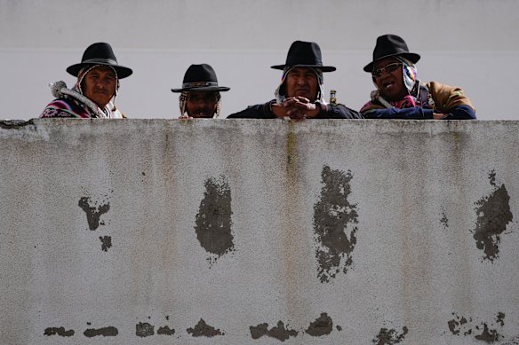 Aymara supporters of the Movement Towards Socialism (MAS) party attend a ritual in honor of the “Pachamama,” or Mother Earth, in El Alto, Bolivia.
