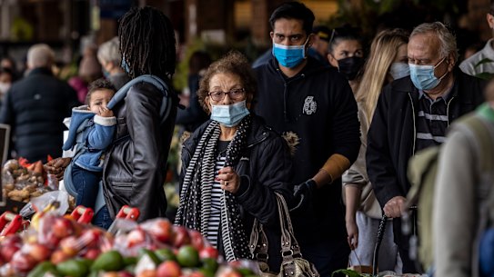 Shoppers with masks at South Melbourne Market as Melbourne’s COVID-19 restrictions continue. 