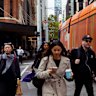 Commuters heading to work during peak hour.