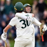 Pat Cummins and Alex Carey celebrate victory in Christchurch.