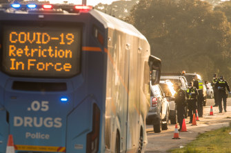 Police manned a booze bus-style checkpoint on the Hume Highway, on the northern outskirts of Melbourne, on Thursday.