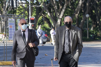 Chris Dawson (left) arrives at the NSW Supreme Court on Tuesday.