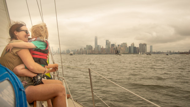 Miriam Hart and Argenta, 3, on the boat welcoming Greta Thunberg to New York.