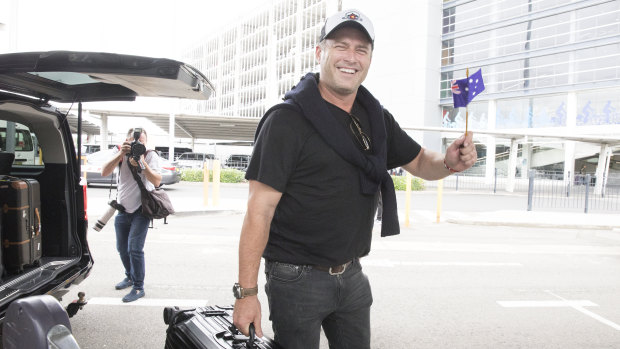 Stefanovic waved an Australian flag as he arrived back in the country on Friday.