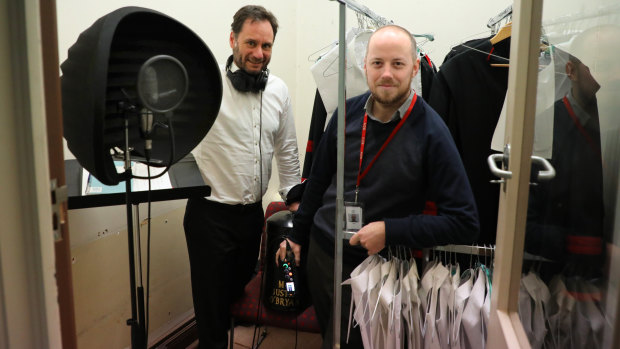 Greg Muller and Evan Martin in their “booth”, which is actually a wardrobe where associate’s robes come back from the dry cleaners. And it's the quietest place they could find inside Victoria's Supreme Court.