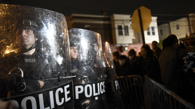 Philadelphia police officers form a line during a demonstration in Philadelphia.