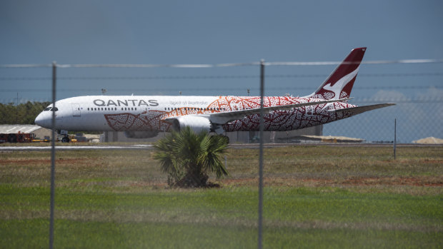 Qantas flight QF110 touches down at RAAF Base Darwin on Friday.