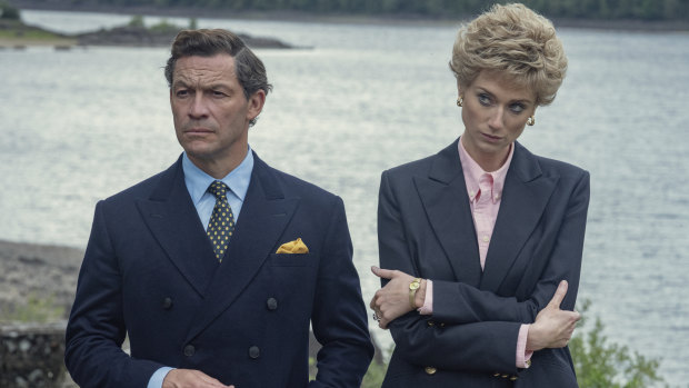 Dominic West as Prince Charles, left, and Elizabeth Debicki as Princess Diana in a scene from ’The Crown”.