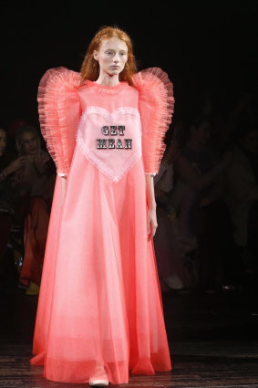 A model wears the Get Mean dress during the Viktor & Rolf Spring Summer 2019 show in Paris.