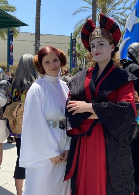 Bring your daughter to work day … fans in “cosplay” as Princess Leia and Queen Padmé Amidala.