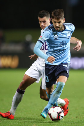 Milos Ninkovic competes with Joel Chianese of the Glory.