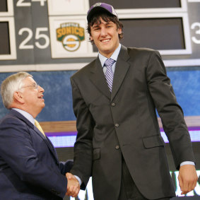 Stern congratulates Australian Andrew Bogut when he was taken as the No.1 NBA draft pick in the 2005 draft.