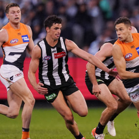 Scott Pendlebury (left) chases Josh Kelly (right) in Collingwood's preliminary final loss to GWS. 