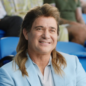 Andre Agassi once again embracing his inner mullet.