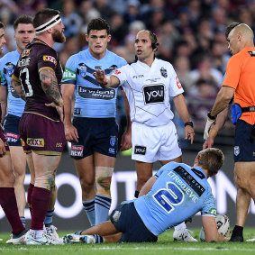 Stand-over man: Josh McGuire floors Tom Trbojevic in game II in Sydney.