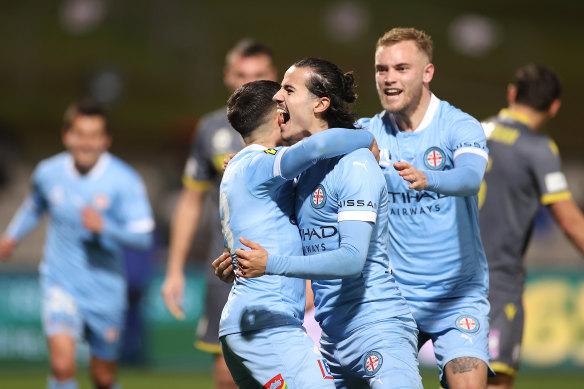 Stefan Colakovski celebrates with teammates after scoring in City’s semi-final win over Macarthur.