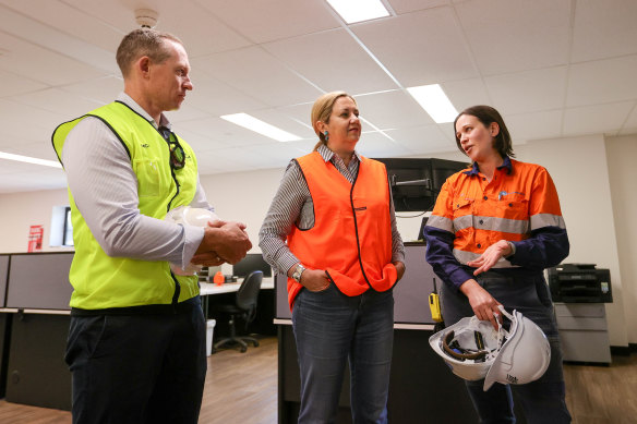 Queensland Premier Annastacia Palaszczuk (centre) and Minister for Energy, Renewables and Hydrogen Mick de Brenni tour a wind farm facility in the South Burnett district of Queensland on Monday.
