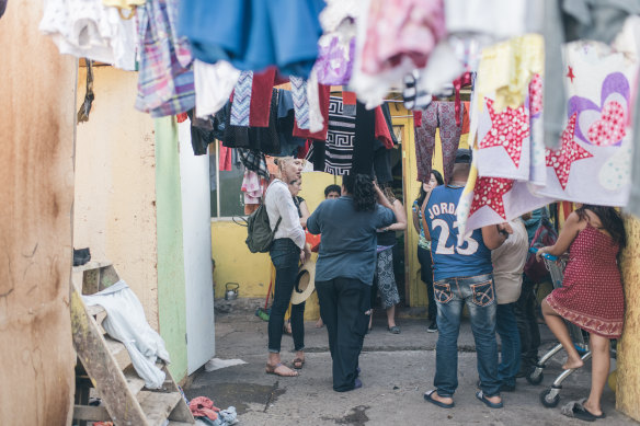 Immigration has grown in Chile in the last decade. Migrants live in overcrowded rooms in low income neighbourhoods like these in downtown Santiago, visited by Puente Social.