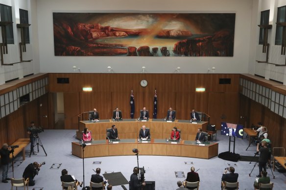 Queensland Premier Annastacia Palaszczuk (front, first from left) and WA Premier Mark McGowan (front, first from right) among other national cabinet leaders during a press conference in December.