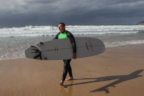 Former prime minister Tony Abbott after a surf at a charity event at Queenscliff in 2015.