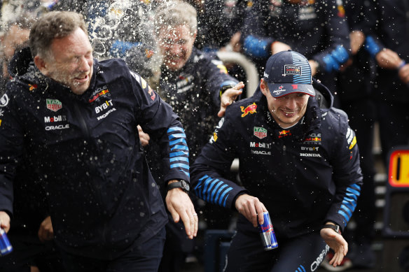 Verstappen and Christian Horner celebrate another win.